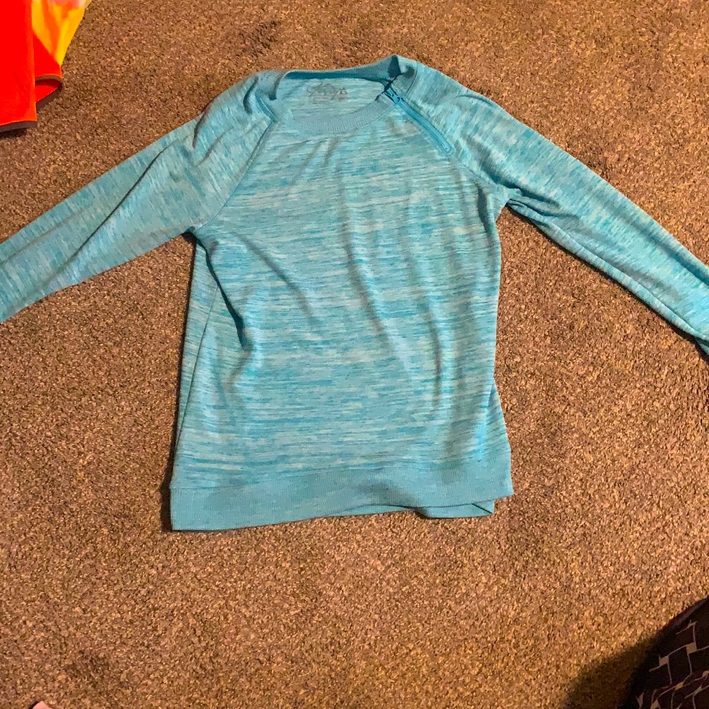 Long sleeve, girls shirt. Comfortable, kinda stretchy material.